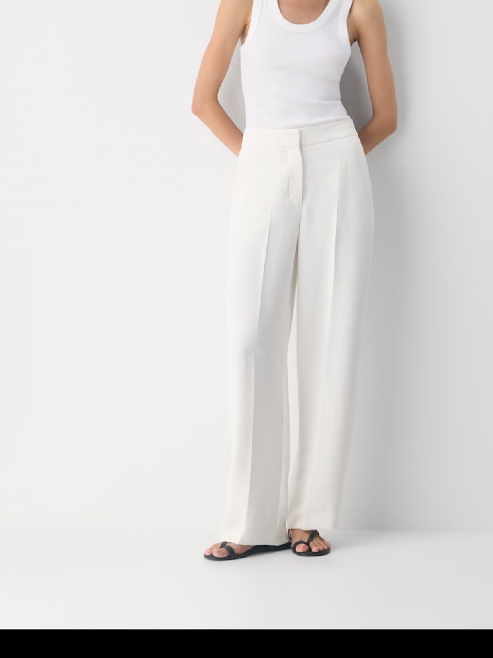 Aritzia Cream Wide-Leg Elastic-Waist Pants… most similar to the Limitless Pant.